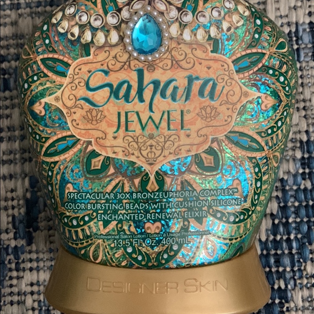 Designer skin bronzing tanning bed lotion new!!